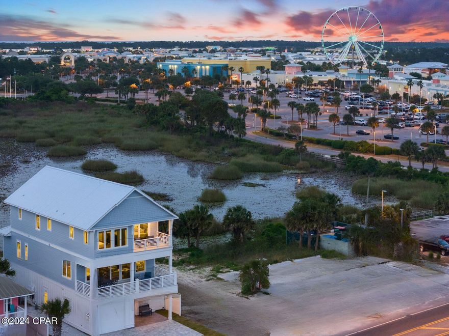 Experience the epitome of luxury coastal living with this remarkable beachfront haven, designed to captivate both discerning investors and those seeking unparalleled opulence. This newly constructed masterpiece, is sold fully furnished and vacation rental-ready, spans 3-levels and boasts 7 bedrooms, 8 bathrooms, and an elevator, offering a rare opportunity to secure your personal paradise. 
Situated just steps away from the Gulf of Mexico, panoramic views await from the second and third-floor balconies, inviting you to immerse yourself in the beauty of the coastline. Every aspect of this home exudes meticulous craftsmanship, with lavish amenities catering to your every need.   Inside, a private elevator ensures easy access to each floor, where seven luxurious bedrooms, including two Gulf-facing primary suites, provide unmatched comfort.
Imagine entertaining in the gourmet kitchen, equipped with top-of-the-line Subzero stainless steel appliances, expansive countertops, and a versatile center island perfect for culinary creations. Outdoor gatherings are elevated in the backyard oasis, complete with a private pool and rejuvenating outdoor shower.
With the potential for significant rental income, savvy investors and luxury seekers alike will be enticed by projected revenues of nearly $300,000 annually. Conveniently located near public beach access and Pier Park, this property seamlessly combines exclusivity with accessibility. Don't miss the chance to experience the allure of this exceptional property - schedule a private viewing today and embark on a journey toward the coastal lifestyle of your dreams. With renowned interior designer Lori Bates Interiors overseeing furnishings and décor, a seamless transition into luxury living awaits. Take action now to unlock the door to unparalleled beachfront luxury and elevate your real estate portfolio. Contact us to schedule your private viewing today.