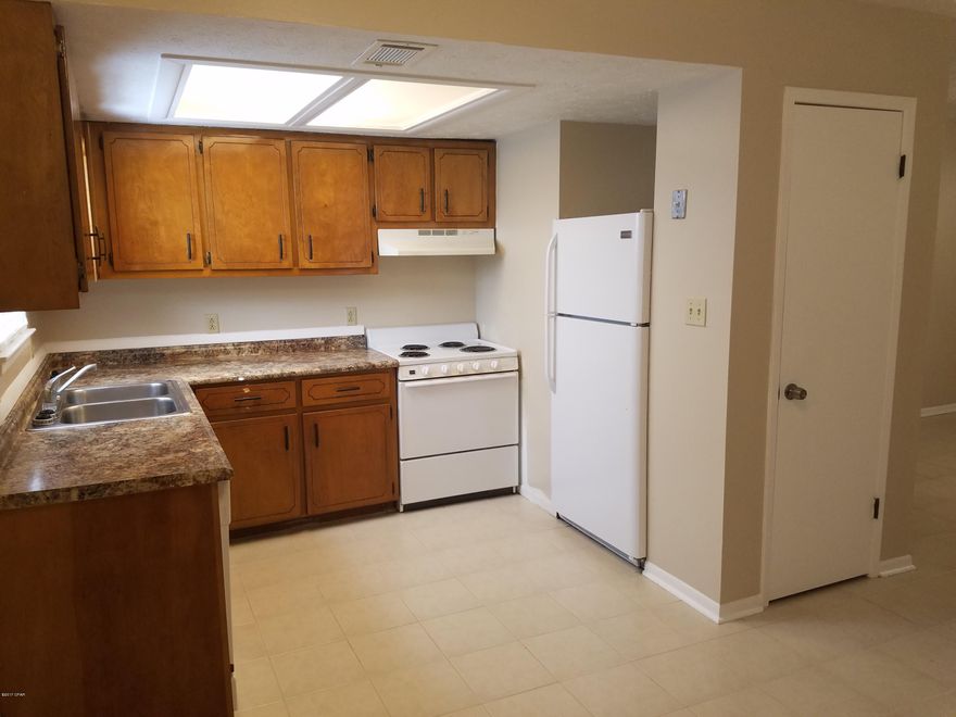 For rent. 2 BR, 1 BA on the first floor centrally located near Front Beach/Middle Beach corridor. Kitchen updated with new counter tops and stained cabinetry, includes Refrigerator, stove/oven, dishwasher, Clothes Washer/Dryer. All ceramic tile throughout the unit. Bathroom has a tub/shower combination and updated vanity. **No Pets Allowed. Rent includes garbage and lawn maintenance.