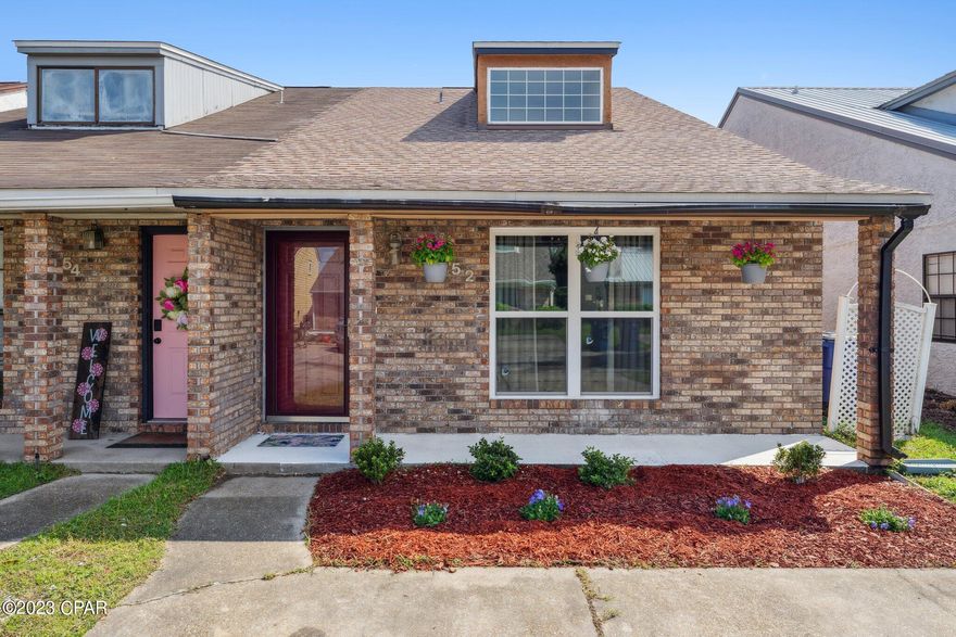 **CURRENTLY UNDER CONTRACT, SELLER WILL CONSIDER BACKUP OFFERS** Don't miss this spacious 2br/2ba 2 story brick town home in desirable Lynn Haven FL! Home has a large open living room with cathedral ceilings and wide dormer window which provides ample light! Loft bedroom with bath overlooks the living area with another full bedroom and bathroom on the first floor. Luxury vinyl plank flooring throughout! Plenty of storage options including a walk in closet upstairs, pantry and under stairs storage. Privacy fenced backyard with low maintenance landscaping and covered patio make it perfect for outdoor entertaining. New roof and high efficiency HVAC system placed in 2018. Windows all completely new and interior just repainted! No HOA fees. Perfect to live in or for rental income. These townhouses are rarely on the market, come and view it today!