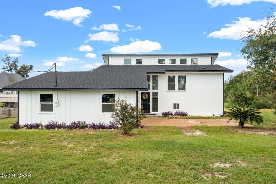 CURRENTLY UNDER CONTRACT; SELLER ACCEPTING BACKUP OFFERS.

Looking for a charming but contemporary house on the water?  You have found it! This Deerpoint Lake house is situated on over a half-acre waterfront lot and is located at the end of a cul-de-sac in the peaceful community of Deerpoint Estates.  With access to Deerpoint lake, this like-new lake house has four bedrooms, two bathrooms, and has been fully remodeled including a new roof, luxury vinyl plank flooring throughout, a new central heat & air unit, new windows, and all new interior and exterior paint.  The main living area features vaulted ceilings with an abundance of natural light and a wood-burning fireplace that has been updated with an elegant white-wash brick that runs from the floor to the ceiling. Exit the newly installed sliding glass doors off the living room and walk onto an outdoor deck to take in the views of the canal and Deerpoint Lake.  The kitchen features all new stainless-steel appliances, granite countertops, and even a wine cooler which is ideal for entertaining. The Master bedroom is located off the main living area featuring water views from every window and a large walk-in closet.  Head downstairs and you will find three additional bedrooms, one additional bathroom with double vanity, as well as a second living area space with wet bar.  Deerpoint lake offers recreational activities such as freshwater fishing, skiing, tubing, wakeboarding, swimming and so much more! Highpoint Park and boat landing is also just minutes down the road. Schedule your private viewing today!