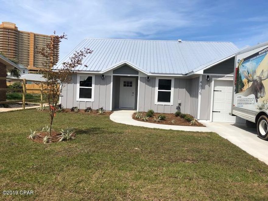 Beautiful New Construction on the quiet East End! Walk or Golf Cart to all your favorite restaurants, the state park and the lagoon from this perfectly located BEACH HOUSE. The exterior features a metal roof, Hardie siding and a fully landscaped and fenced yard. The interior includes Luxury Vinyl Plank Flooring  through out the open floor plan.  Craftsman style cabinets, granite counters and upgraded ''Black Stainless'' appliances give this home great an upscale feel. No HOA's , No Flood Insurance and on City water and sewage! Hard to find all this at a bargain price!