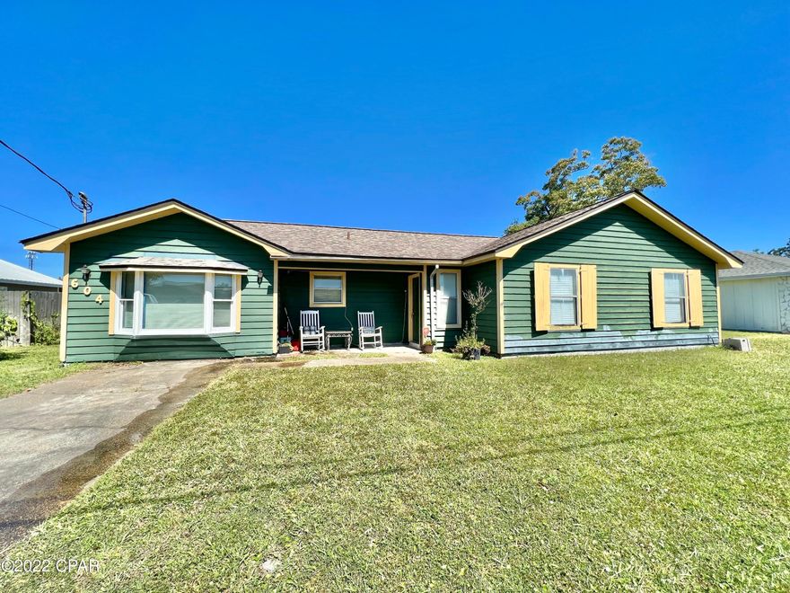 Come check out a price to sell home in the historic Lynn Haven Community of Pine Forest Estates. Rare to find a home in the Lynn Haven Area under $300K. New updated kitchen counter tops, breakfast bar and LVP Flooring. Sellers installed brand new carpet on Oct. 10th. The property is fenced  w/ a big back yard. Converted garage bonus room that can serve as an office or extra living space. House in the heart of Lynn Haven, FL, close to shops, restaurants, coffee shops, post office, schools, and in walking distance from ball fields and Cain Griffin recreation parks (for walks, bike rides and more).  This home will not last long. Come check it out today.