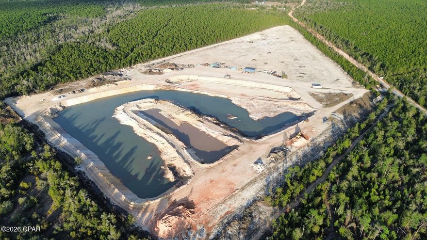 The Subject Property is a 55-acre, fully permitted and active borrow pit located in northern Bay County.  Initially surveyed to hold +1.52 million cubic yards of sand, clay and sand/clay mix with current estimated remaining capacity in excess of 800,000cy.  With convenient access to major highways (Hwy 231, Hwy 77, Hwy 20), the property is well positioned to efficiently serve the increasing demand for fill dirt across Northwest Florida and surrounding areas.