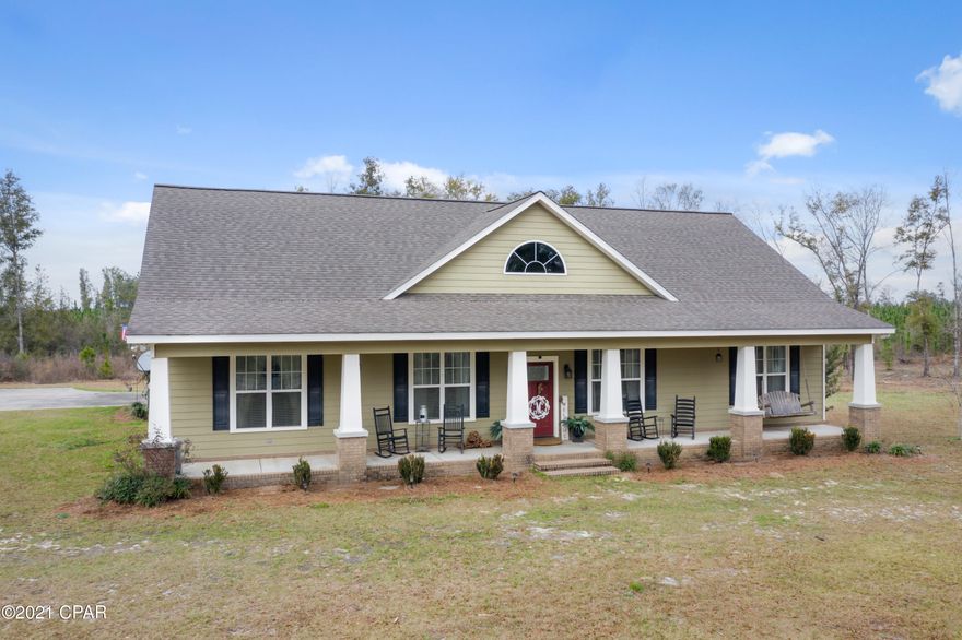 **UNDER CONTRACT - ACCEPTING BACK-UP OFFERS. This attractive Craftsman style home was built in 2007.  This home features 10 foot high ceilings with crown molding, 4 bedrooms, 2 bath, large light bright & airy family room with wood burning fireplace, formal dining room, kitchen with breakfast bar, plus breakfast table area, granite countertops with stainless appliances. 2 car attached garage with attic storage. This is a split bedroom plan with a large luxurious master suite. Outside has rocking chair front porch and large rear patio. 5.73 acres on corner lot on paved road.