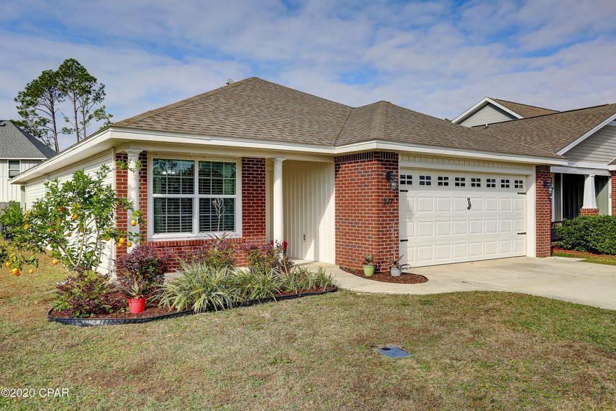 This conveniently located, 3 bedroom 2 bath home with 2 car garage is in the family friendly neighborhood of Woodlawn Village.  This well kept home is on a larger corner lot.  The home features all new LVP flooring throughout.  Kitchen has solid surface counter tops, stainless appliances and custom cabinets that is open to a spacious and bright family room.  As an added bonus there is a bar area for extra seating off the kitchen.  The roomy master bedroom has 2 walk in closets and a private full bath.  The other two bedrooms are a nice size with plenty of storage.  Come see this one right away...it won't last long.