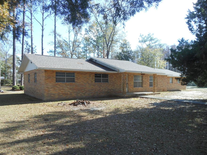 Come view this brick home with great floor plan and a large, tree shaded, city lot.  There are so many closets for extra storage space and a large room off the kitchen that would make a great pantry. The roof was replaced this year.  The double car carport leads to an covered patio and large storage/workshop room.  This home is near the hospital, shopping and all the great restaurants and downtown Chipley.  Don't miss out on this great opportunity. All sizes, information approximate, buyer should verify for themselves.