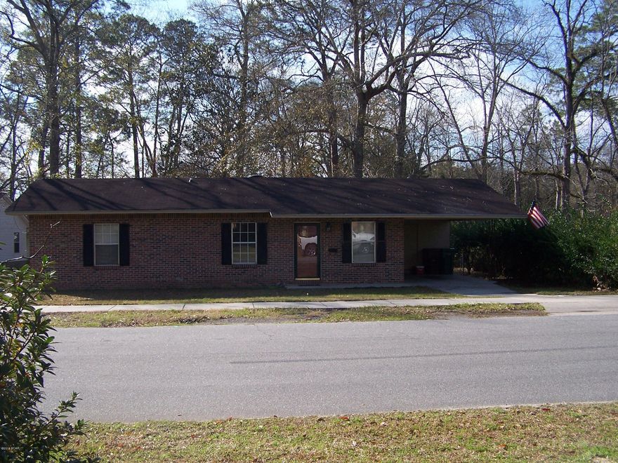 Conveniently located in downtown Chipley is this all Brick 3 Bedroom 1.5 Bath Home. Large in town lot with fenced backyard, storage building and Carport. Most of the home has newly tiled floors in open floor plan Living Area. Kitchen has a breakfast bar and large storage room. Spacious Laundry Room opens to nicely shaded backyard.
