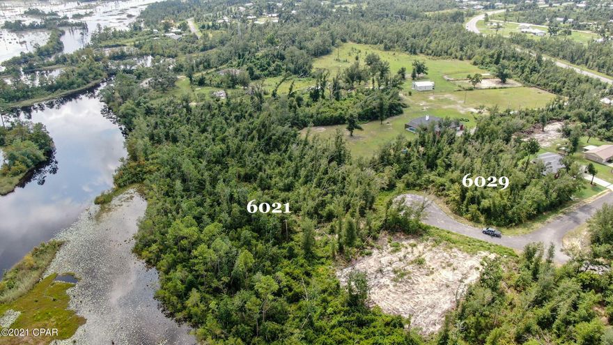 Currently under contract, Seller is accepting backup offers. --Looking for a private lot to build your forever home on?  Now is your chance to have your own little cul de sac!  Don't miss out on these beautiful views, drive by and check it out today! The lot next door at 6029 Wedgewood Lane is also available.