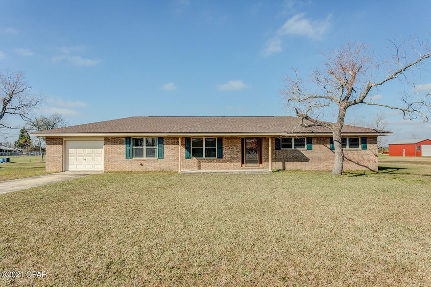 Horses allowed on this lovely ranch style home that is located on a large 2.07 acre lot that offers a  lot of potential. There is a large master bed with an ensuite bath, along with 2 other spacious bedrooms. A full bath for guests, a formal living room at the front of the home, and a large laundry room. The kitchen and breakfast area has been remodeled and is attached to a formal dining room. The oversized family room has a beautiful fireplace, built-in bookshelves, and a cathedral ceiling with beams running overhead. This ideal location allows for horses and offers the feeling of the country while only being just minutes away from town and shopping. Don't miss out on a chance to own this peaceful oasis!  Call today for your private viewing.