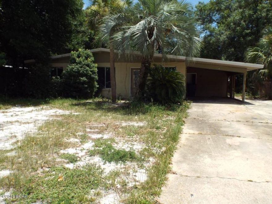 Three bedroom two bathroom house on .2 acre lot with carport needing some TLC offered as is.  The property has a larger enclosed patio.  All sizes approximated or taken from other sources, please verify accordingly.