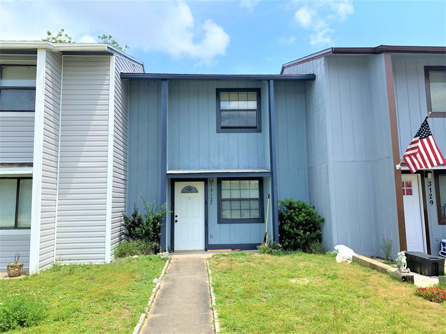 2 Bedroom 1.5 Bath townhouse. Tile downstairs and nice wood laminate floors upstairs. 

Move in Ready but needs a few cosmetic repairs completed on the outside; siding, painting etc.  Great opportunity for a handy person. It could be a great first home or rental/investment property.