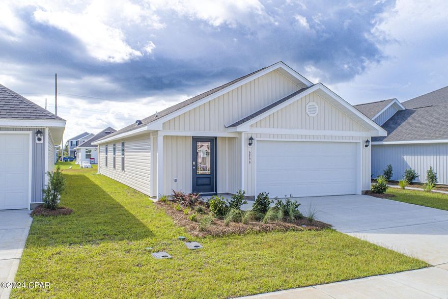 New construction home located at 6599 Kettles Street. The Burke is a 3-bedroom 2 bath, 1384 square foot home with an open floorplan.  This home features a large living area, open to kitchen and dining area. The kitchen features a center island with white cabinetry, stainless appliances including a stove, microwave and dishwasher. Interior features of this home include stainless appliances, EVP vinyl flooring, durable laminate countertops and carpet in the bedrooms. Liberty neighborhood is conveniently located in beautiful Panama City off Star Avenue near 231. Located just 25 minutes from Tyndall Airforce Base, 20 minutes to hospitals, and less than 15 minutes to shopping, restaurants, and grocery stores you will be amazed at the convenience once you enter the winding entrance to this beautiful sanctuary. Liberty, D.R. Horton's premier new lifestyle community, offers a 7,500 square foot community center with full gym, wellness rooms and much more. Additionally, behind the community center is a water wonderland with resort style pool, splash pads, and an outdoor grilling kitchen with seating.