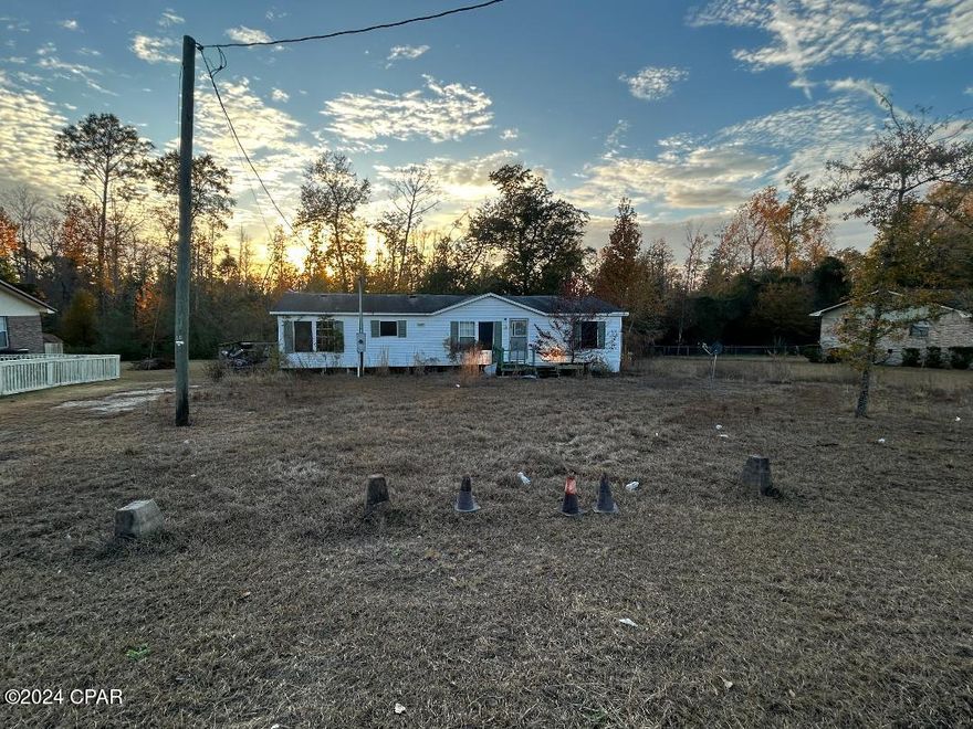 Come check out this lot located just outside of Blountstown City Limits! This lot comes with a septic tank and is on public water. The mobile home that sits on the current property has no value and is ready to be moved for your next home.
