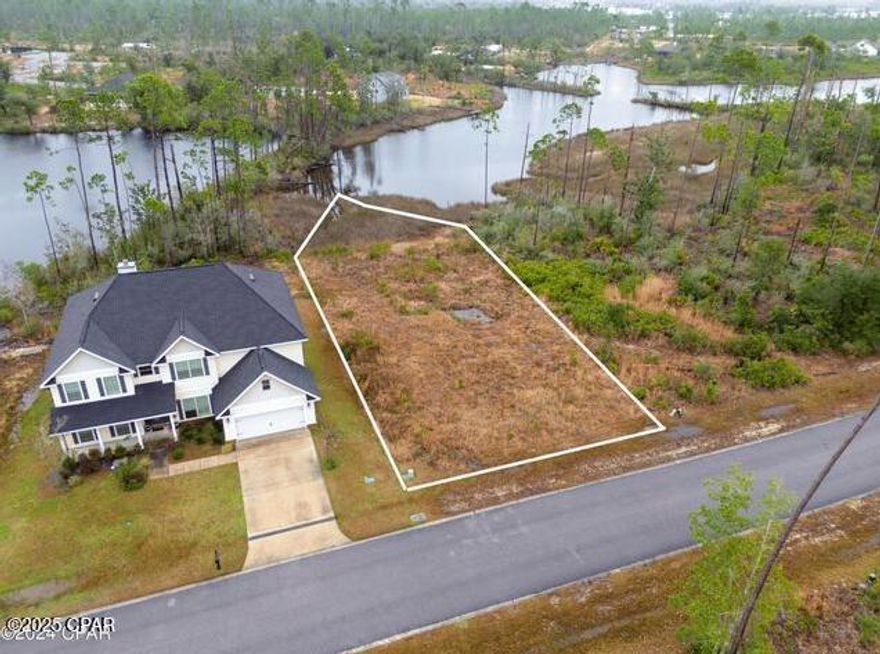 Waiting for the opportunity to build a beautiful new home? This cleared vacant lot in Laird point is your blank canvas. Seller has HOA approved blueprints. The lot offers an amazing view of Laird Bayou and the Lake. The lot does not allow a dock per HOA. The water can be accessed by foot for Kayaking, fishing or just relaxing.  Laird Point is a gated waterfront community offering several amenities such as RV storage, tennis court, and so much more. All underground utilities and city water/sewage. Information provided is deemed reliable but is not guaranteed and should be independently verified by the buyer.