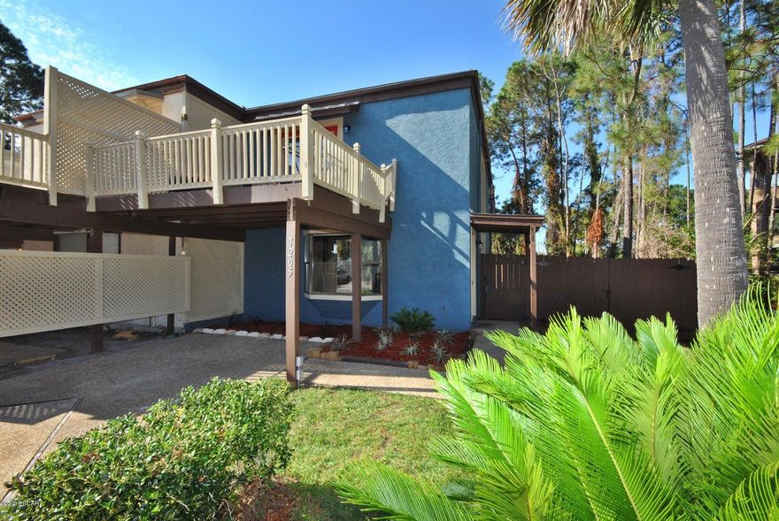 *SELLER OFFERING $4,000.00 IN CLOSING COST* ''THIS IS AND AMAZING HOME WITH AMAZING PRICE'' Fantastic Townhouse * Completely remolded * Large 1280 SF Two bedroom and TWO full bathrooms * the new kitchen features new title flooring granite counter tops, custom cabinets with backsplash and stainless steel appliances * Living room with wood burning fireplace and view of the lagoon * the two huge bedrooms feature wood flooring and balconies * The rear yard is fenced with a new roof and septic * This completely remolded home is 1/3 mile from the gulf and PCB incredible beaches*