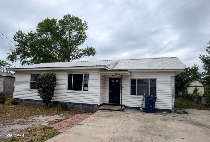 Don't miss this opportunity to own right in the middle of Panama City, in St Andrews area, and only 13 minutes to the beaches.  St. Andrews is vibrant with restaurants, businesses, marina, etc and this home is just as convenient to downtown and all that is offered.  There are 4 bedrooms and 2 full baths, with a 3rd bath that has been gutted and is ready for remodel.  The back yard is partially fenced and a great place for enjoying get-togethers, cookouts, ballgames, with the large screened porch across the rear of the home.