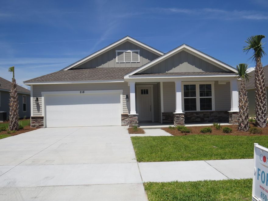 This home has a Mako Floor Plan with a Coastal Elevation and is MOVE IN READY! Photos represent this gorgeous home with upgraded gray cabinets, wood look tile in main living areas and a beautiful master bathroom!

Each home includes standard features such as designer carpet in the bedrooms, 8 ft. 2 panel craftsman doors, brushed nickel fixtures and faucets throughout, insulated (R19) interior common walls and insulated (R38) ceilings, and durable Sherwin Williams premium interior wall paint. Kitchen features stainless steel appliance package (range, dishwasher, & microwave) and oversized 36'' wood cabinetry with crown molding, and granite counter tops. Full bathrooms include raised vanity heights, large tile flooring in bathrooms and laundry rooms, 2 x 6 Exterior Walls. Construction, and hurricane tie down rod anchor system Exterior of home includes coastal and craftsman architecture, spacious 2 garage, architectural roof shingles with an extended warranty, low maintenance aluminum fascia and vinyl soffits, termite treated foundation, Hardi-Plank siding with an extended warranty, and durable Sherwin Williams Loxon exterior paint. All new construction homes are backed by a 2-10 Home Buyers Warranty. Your HOA dues includes lawn maintenance for the home. The Whisper Dunes subdivision includes sidewalks, curb & gutter, a beautiful community pool and pool cabana. Whisper Dunes is a golf cart friendly community and you are within a short driving distance to our beautiful beaches, Pier Park shopping, NW FL Beaches International Airport, and the beautiful 30A South Walton area. Choose your lot, floor plan & elevation, choose your design options, and pick your paint colors! All measurements and sizes are approximate, please measure for accuracy and verify all sizes.