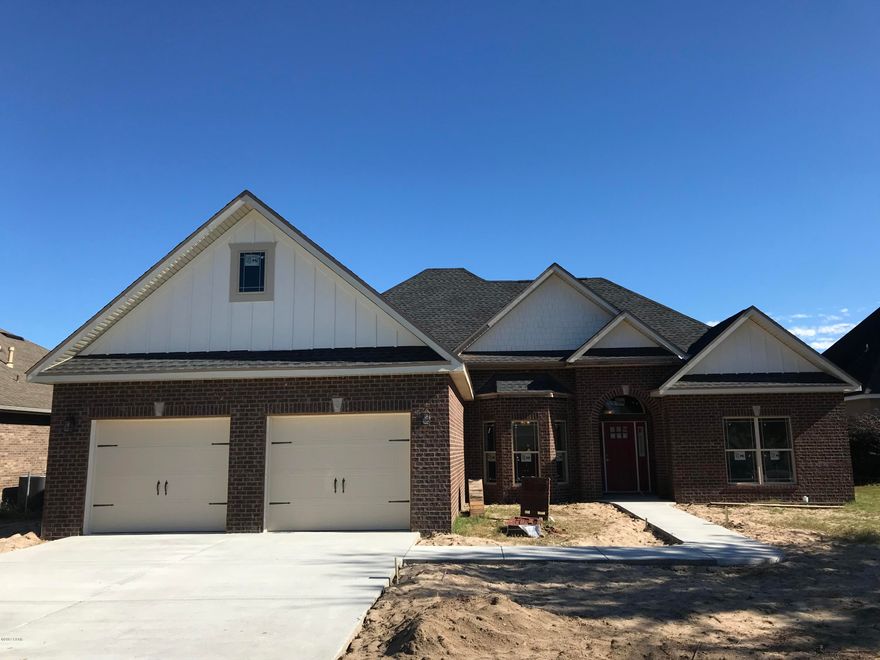 Affordable new construction on Mills Bayou in Lynn Haven with over 80' of water frontage. The Madison is a 2406 sq. ft. new home with 3 bedrooms, 2.5 baths, a sun-room and spacious master suite and master bath. Elegant finishes like 3 cm granite counter-tops, designer cabinetry, 3 panel craftsman style interior doors, Premium EV vinyl plank flooring and crown molding in main living area's plus tile master shower and stainless steel range, dishwasher and microwave. Extra touches include large garage, 10' ceilings with 11' tray in living room and master bedroom, 2 x 6 exterior wall construction and in-wall pest control system. Proposed construction. Home will take 7-8 month to build. Pictures not of subject property but of similar floor plan.