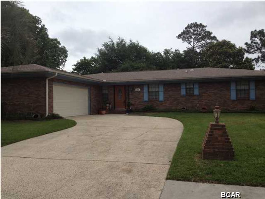 *****REDUCED PRICE***** VERY well-maintained all brick ranch just minutes from TAFB and Panama City. Enjoy the back yard patio under the spreading hardwood trees and take a dip in the beautiful inground pool. This four bedroom two bath home is situated in lovely Heritage Woods and is surrounded by homeowners who take pride in the appearance of their properties. The interior of this house is great for families who like the functionality of an open floor plan with the convenience of easy clean tile flooring, a formal living room, dining room, den and Florida Room. The kitchen island serves as a focal point for the main living area. A two-car garage with storage, washer/dryer hookups and large workbench all combine to make it extremely efficient. To make your landscaping jobs more