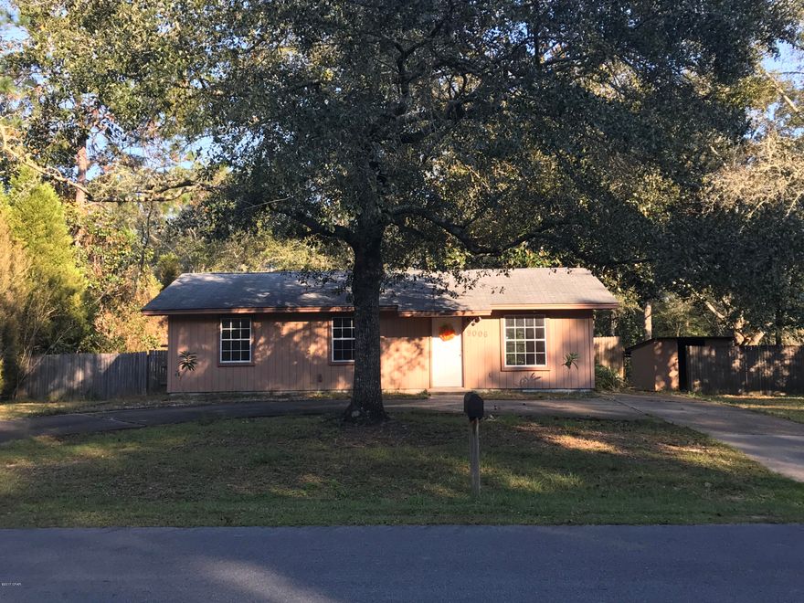Great 2 bedroom, 1 bathroom starter home in a quiet, country setting with paved roads. This home is just 10 minutes from the Panama City Mall and has so much to offer. From the large lot with a privacy-fenced back yard and several large trees to the work shed with additional storage on the property, you will feel right at home. The roof is approximately 12 years old. All dimensions are approximate and should be verified by the buyer.