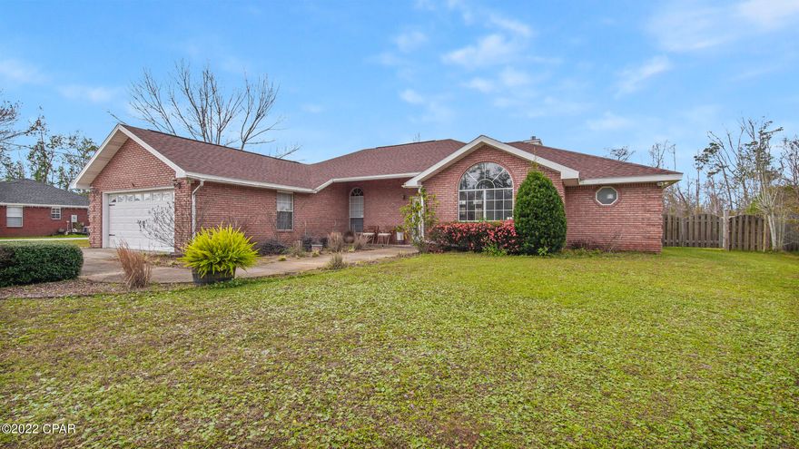 Beautiful 3 bedroom, 2 bath brick home close to Tyndall AFB on .75 acre!!! This home features an open, split bedroom floorplan with large covered back porch, gas fireplace, vinyl plank flooring in living room and master bedroom. The kitchen offers oak washed cabinets and corian counters with matching stainless appliances including a side by side refrigerator w/bottom freezer drawer, gas stove and breakfast bar. The master bedroom has trey ceiling, LVP flooring, and walk-in closet. The master bath features double vanity, corner tub and separate shower. Attached 2 car garage. The detached garage will not be usable by tenants.