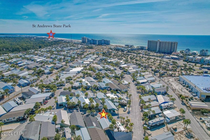 Check out this stunning Venture Out home! Fully furnished with 2 bedrooms, 2 full bathrooms, and a bunk area, you'll fall in love with this spacious well kept coastal home. The living area is the perfect place to kick back and relax after a long day at the beach. In the kitchen you'll find plenty of cabinet and counter space, and the dining area. The master bedroom suite is straight out of a magazine with a wood shiplap ceiling, white shiplap accent wall, and a gorgeous bathroom with a large walk-in shower, white cabinets, and quartz countertops. You also have an additional entrance/exit through the master bedroom. The second bedroom is large, has two full closets, and a bunk area to accommodate extra guests. The second full bathroom has been updated with a tiled shower and new hardware and fixtures. Take your new golf cart across the street to the private beach entrance and lay out by the Venture Out Gulf front pool, or walk down to the sugar white sand to hunt for seashells. This rare find is perfect for a second home or investment opportunity. Some amenities in Venture Out are a Gulf front pool, Bayfront pool, private beach access, fishing pier, boat ramp, children's playground, and so much more, this community has something for everyone! This home is fully furnished ( minus a couple of personal items) and ready for you and your family, or rental guests to stay. This home is a must see!