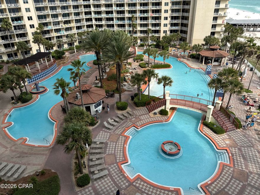 LOW FLOOR ALERT!!!  2BD Plus BUNKROOM and 3 FULL BATHROOMS.  This is the style that people love, with the 3 full bathrooms.  Living room and balcony have a great view of the Shores pool and the GULF OF MEXICO.  Built-in shelves and entertainment area in kitchen.  Priced to sell and low floor is very valuable in this building.  You can DRIVE UP TO 7TH FLOOR AND WALK OVER TO YOUR CONDO.   Lots of open parking on the 7th floor parking deck.