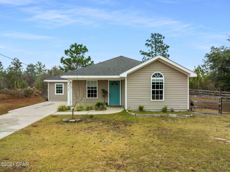 Fantastic curb appeal invites you home to this spacious home on a quiet street!  Located just a little over a mile inside Sunny Hills, it is super convenient to get to Hwy 77.  This beautiful dwelling features a modern updated kitchen with crisp white cabinetry, white tile backsplash, stainless appliances, a built-in desk with shelving and a large pantry.  A converted garage has become a spacious mud-room, laundry, extra storage and an additional bedroom adorned with a shiplap wall.  Entertain your guests around the fire pit in the large fenced-in back yard.  This is just what you've been looking for so contact your favorite realtor for a showing today.