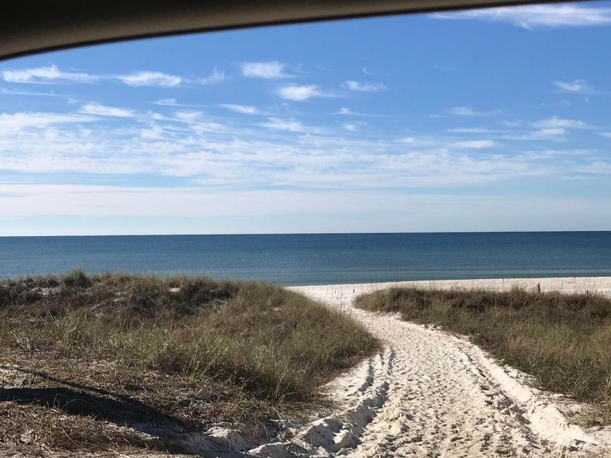 Great corner lot in Laguna Beach near the Carousel and 30A. There is a 1968 mobile home with 2 bedrooms and 2 bathrooms on the lot that with a little work would make a great vacation home, investment property or primary residence. Verify measurements if important.