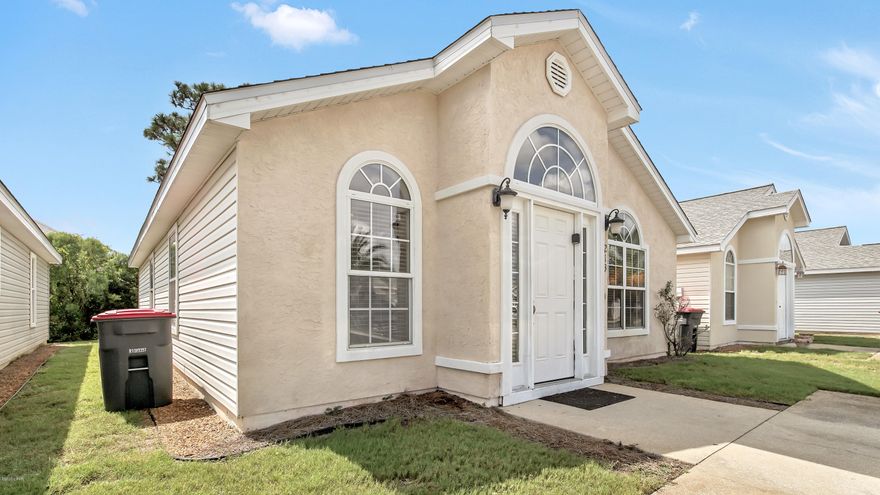 CURRENTLY UNDER CONTRACT, SELLER ACCEPTING BACKUP OFFERS Price Reduced! This is the  perfect beach get-a-way or beach lover's home. This cute house is only a short distance to the sandy white beaches (a mere half mile) and only steps from the 2 community pools. The flooring throughout is a ceramic plank tile making for a rich look and low maintenance. The roof, air conditioning  system, and water heater were very recently replaced.  The home has also been freshly painted inside and out! There is a shower for beach goers off the screened in and tiled back porch.  This home is situated close to all the great amenities Panama City Beach has to offer including shopping, restuarants, beach, water park and golfing! Pier Park is only about 3 miles away. Palm Cove association covers the lawn care, Palm Cove association covers the lawn care,