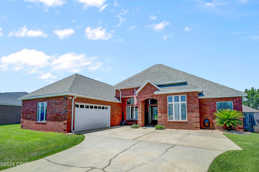 CURRENTLY UNDER CONTRACT, SELLER WILL CONSIDER BACKUPS.

Luxurious contemporary coastal charm in the Landings Golf Course Community. 

Whether you're looking to relocate to Florida or simply move into a new chapter of your life, 108 Landings Dr in Lynn Haven, FL is truly a must see home.

Upon entry you'll be greeted with an abundance of natural light flooding the open-concept upscale living space that's comprised of formal living and dining rooms that are open to a centrally located chef's kitchen and den. Nearly every space in this thoughtfully designed home flows freely into the next.

Inside a chef's kitchen you'll find quartz countertops, beautiful and pristine new stainless steel appliances, and a spacious island sink and bar—a sensational culinary haven for preparing family meals and hosting friends. The adjacent dining area overlooks a very inviting and fully enclosed back porch and grilling area complete with hot and cold water supplies, a lush backyard with stone placed pathways, and a brick paver surrounded salt water pool where the sounds of gentle flowing fountains easily soothe the spirit...especially at twilight.

With soaring twelve and fourteen feet ceilings creating an airy and open ambiance coupled with an aesthetically pleasing color palette throughout, this home is an oasis all its own that's truly delighting to the senses. Ceramic flooring throughout all central living spaces lead to lush carpeting throughout each of the four bedrooms and the in-home office space or bonus room. Doors measuring eight feet high leading into every room in the home offer up a feeling of security and stability while finishing touches such as dental tooth crown molding adorning kitchen cabinetry offer up a luxurious touch that's uniquely its own. New stainless steel kitchen appliances, updated HVAC systems, a newer roof, recessed lighting, a lower maintenance salt water converted swimming pool and mature Palm trees situated upon mature landscaping, plus a meticulous maintenance history combine in this home to evoke a true sense of unprecedented market leading value.

The master suite is a serene sanctuary, complete with an ensuite bathroom featuring a jetted soaking tub and separate shower. Three additional bedrooms provide ample space for family and guests. 

Closets, cabinets, shelving, and floored attic storage spaces in this home are all generously apportioned. The oversized multicar garage measuring approximately 632 square feet includes a 220 volt power supply, side yard access, and additional storage space while providing a safe haven for your vehicles.

The fully enclosed Florida Room while boasting some 407 square feet of outdoor living space is sure to delight with its in place gas supply lines for the ultimate grilling experience while overlooking the 13' x 32' saltwater swimming pool. 

Please inquire today and let's get your private showing scheduled.