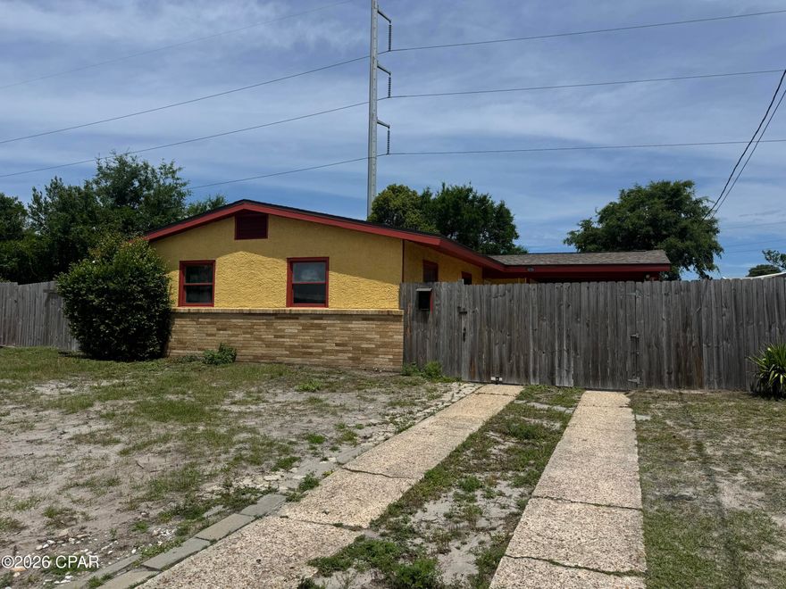 ATTENTION INVESTORS!! Conveniently located minutes from the vibrant St. Andrews area and 15 min from the beach, this home is in need of repairs and updates, but it has solid bones. Featuring 3 bedrooms, 1 bath, large eat in kitchen and nice size family room, this space is a blank canvas.  The roof was replaced after Hurricane Michael. The yard is fenced in. Outside storage/laundry room with nice carport area. This would be the perfect rental investment or resale project.
The area is great, close to everything and many houses on the street are also updating.
Come take a look and think of the possibilities! Call me today!