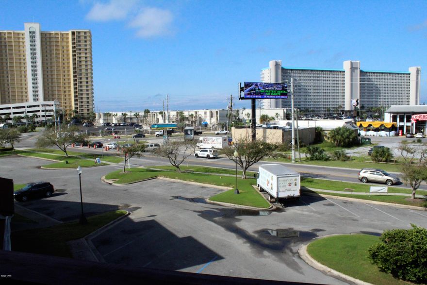 'CURRENTLY UNDER CONTRACT, SELLER ACCEPTING BACKUP OFFERS' There is an Elevator!  You will Love this FANTASTIC location for investment, second home or permanent residence.  This is a lovely open and spacious 1 bedroom 1 bath condo.  This wonderful condo has been updated with newer kitchen cabinets, stainless steel appliances and granite counters, freshly painted interior, newer carpet and newer ac unit.  The complex has lagoon access with boat slips on a first come first serve basis.  There is also parking for boat trailers on site.  If you prefer the beach just cross Thomas Drive and public access for the ''Worlds Most Beautiful Beaches'' is convenient for the beach lovers.  Complex has a pool overlooking the lagoon.  Also, within walking distance to restaurants, shopping, amusement activ