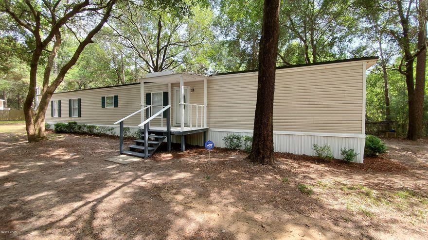 Completely renovated from top to bottom! Split floor plan, spacious living spaces, laundry room and plenty of storage space. New flooring, stainless steel appliances, cabinets, vanities, guest tiled shower and brand new HVAC. This home sits on .44 acres and has beautiful mature trees providing privacy to your yard, 2 storage buildings and even a chicken coup! The separate RV with new covered deck and power will convey with the sale of the home at no additional cost to the buyer (Seller will sign the title off to buyer). All measurements are approximate, buyer to verify if important.