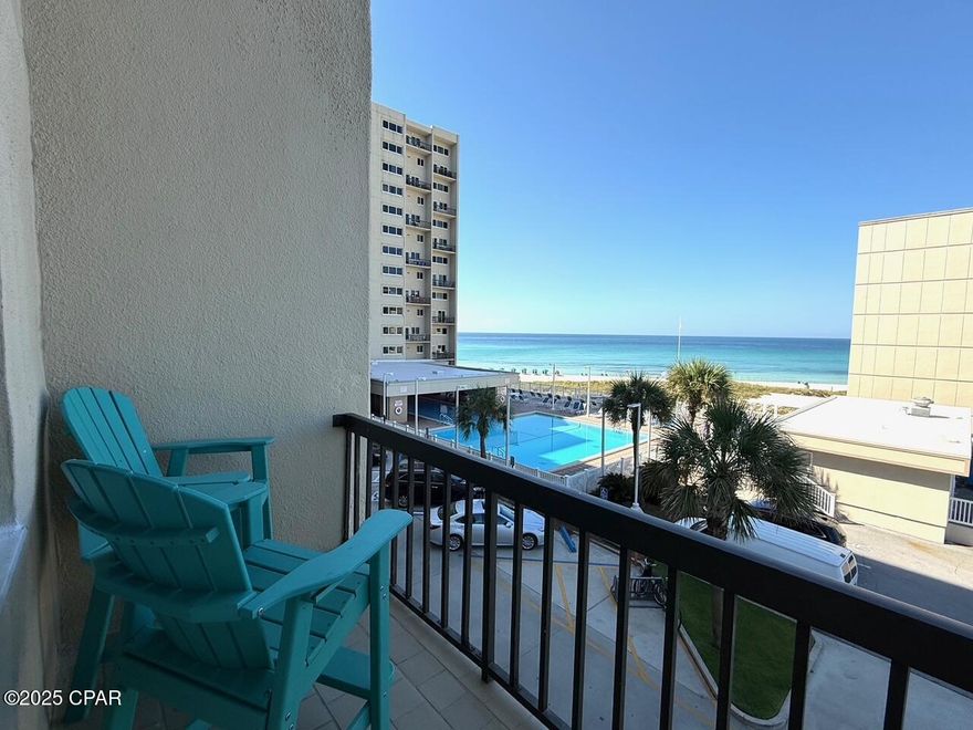 A beautiful first floor end unit condo in the highly sought-after Pinnacle Port community of Panama City Beach. This two-bedroom, two and half bathroom coastal retreat offers the perfect blend of comfort, convenience, and stunning Gulf views. If you don't want to wait for the elevator, you can take the stairs for quick and easy access to your unit—perfect for a quick walk or to get to the pool and the beach! Inside, this charming beachside escape features a spacious open-concept living area is bathed in natural light, with large sliding glass doors that lead to the patio just steps from the beach. The primary suite offers a peaceful retreat with an ensuite bathroom and water views, while the second bedroom provides a cozy space for guests or family. Pinnacle Port is a gated, resort-style community offering an impressive array of amenities. Enjoy two pools, including a heated pool for year-round relaxation, direct private beach access, and boat slips with a ramp on Lake Powell for endless water adventures. Stay active with tennis and pickleball courts, shuffleboard, bocce ball, and a basketball court, or unwind in the sauna and steam room. The fitness center, clubhouse, BBQ picnic areas, and playground ensure there's something for everyone. Plus, with 24/7 gated security, you can enjoy peace of mind in your private paradise. Nestled next to Camp Helen State Park and just a short drive from Scenic 30A, this incredible location provides easy access to world-class dining, shopping, and entertainment.