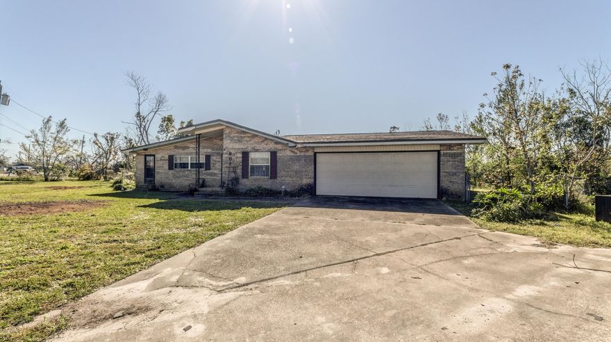 Don't let this one get by -- it is a must see. This home features 3 Bedrooms and 2 1/2 baths completely furnished. New A/C, new dishwasher, new roof. Washer and dryer convey. There was no interior damage. A large family/living room is adjacent to a comfortable eat-in kitchen. Two of the nice sized bedrooms (the master and one additional) have walk-in closets. There is an office and a craft room with hidden pull down craft table. The home is located in close proximity to Tyndall Air Force Base. This home sits on six lots . The backyard has a pecan tree, orange, tangerine, lemon, and fig trees, all fruit bearing. The home was built in 1952, but was renovated and has an effective year built of 1982. All measurements are approximate, pleases verify if important.