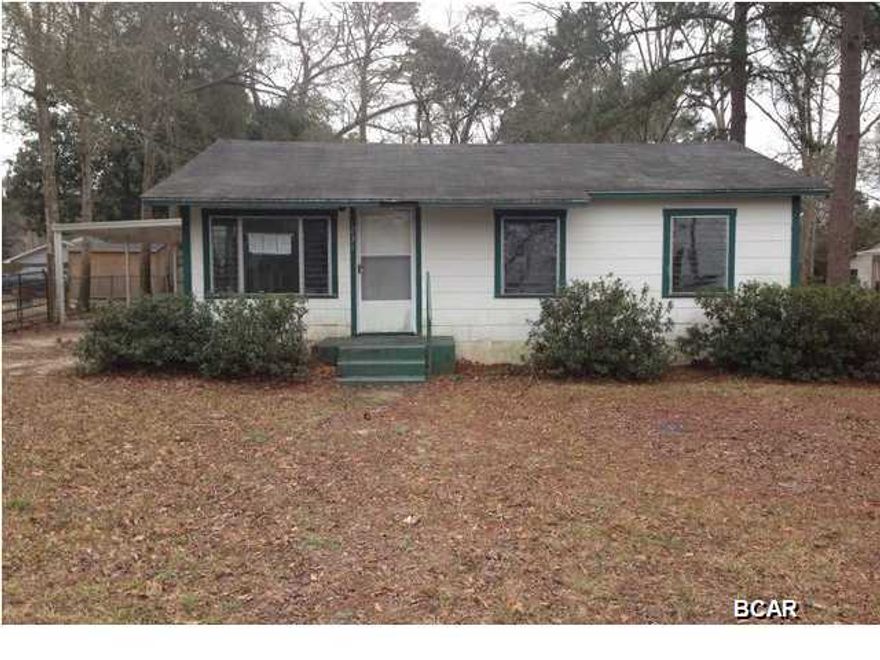 Great starter home in town, close to stores, schools and churches. Large lot with shade trees. This property is UI (Uninsurable) Property is estimated to need more than $5000 in repairs by FHA Appraiser making it NOT eligible for a standard FHA loan.
