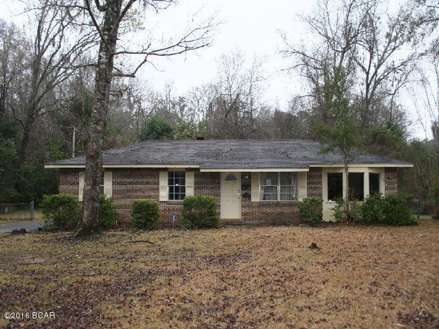 PRICE REDUCED!! This is a brick single family residence with potential. It has 3 bedrooms, 2 baths, a large family room with fireplace insert, a formal living room, dining area and another den or sitting room. The location is in town with city water and sewer. The location is very convenient to all local amenities.