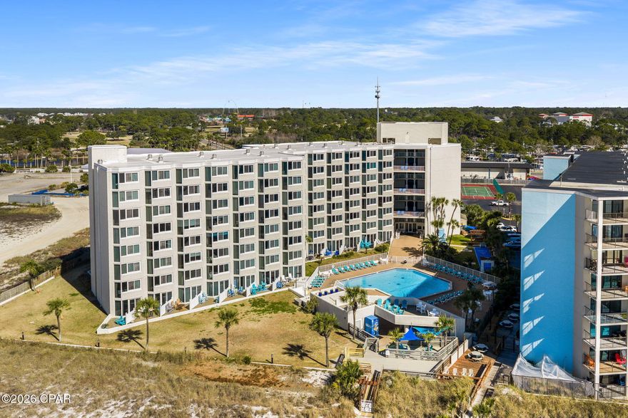 Investor-friendly beach getaway opportunity at Top of the Gulf Condominiums priced under $250K! This beautifully updated first-floor studio offers strong vacation rental appeal and an unbeatable location within walking distance to the brand new Tootsies Orchid Lounge, dining, entertainment, and beach attractions. The unit features a coastal chic design with 2 spacious beds, a fully renovated bathroom, upgraded efficiency kitchen with updated countertops, backsplash, appliances, and a spacious private patio ideal for relaxing outdoors. Additional updates include flooring, HVAC, and hot water heater in 2022. Located just steps from the pool, tiki bar, fitness center, game room, and private beach access. Top of the Gulf has also completed extensive property improvements including windows, doors, exterior epoxy flooring, and beach accessibility enhancements. Turnkey, affordable, and rental-ready.