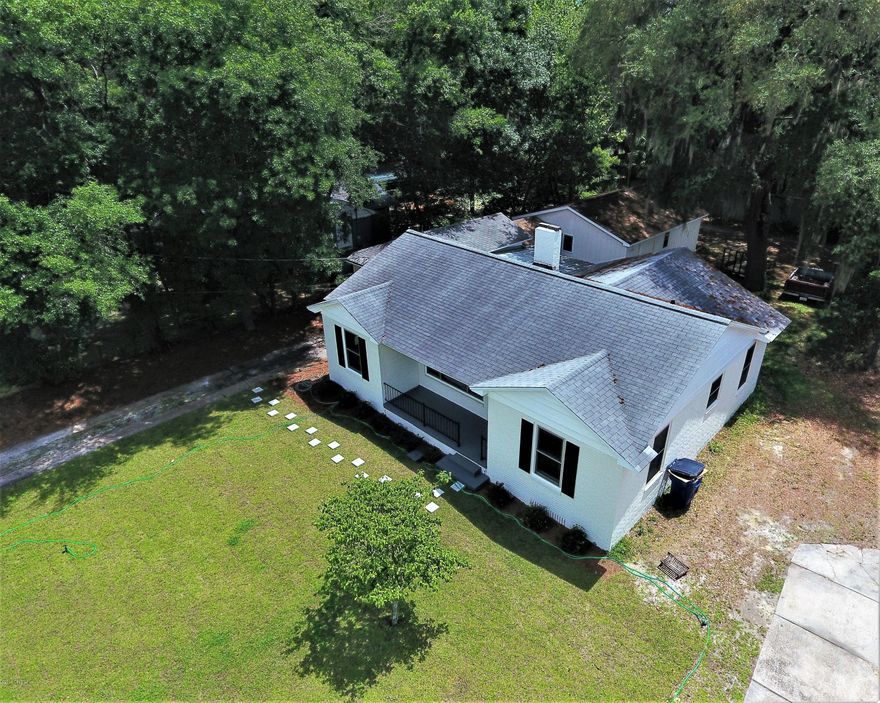 The COVE, historic and highly desired, featuring an updated 4 bedroom home with 2 baths, real wood burning fireplace and a detached 2 car garage with plumbing and power, hard to find and located on South MacArthur! Outside the home  and garage have both been newly painted, new sod and a new HVAC. The interior has new paint, flooring throughout entire house, ALL new countertops, appliances, fixtures and lighting. The home is .2 Miles from the St Andrews Yacht Club and .7 Miles from Beach Drive Sunsets. The Cove is golf cart friendly, walking, biking, jogging and common and parks are situated throughout the community as well. Surrounded by marinas, locally owned restaurants, shops and public and private schools, the Cove is truly one of a kind. Be our guest and come visit today