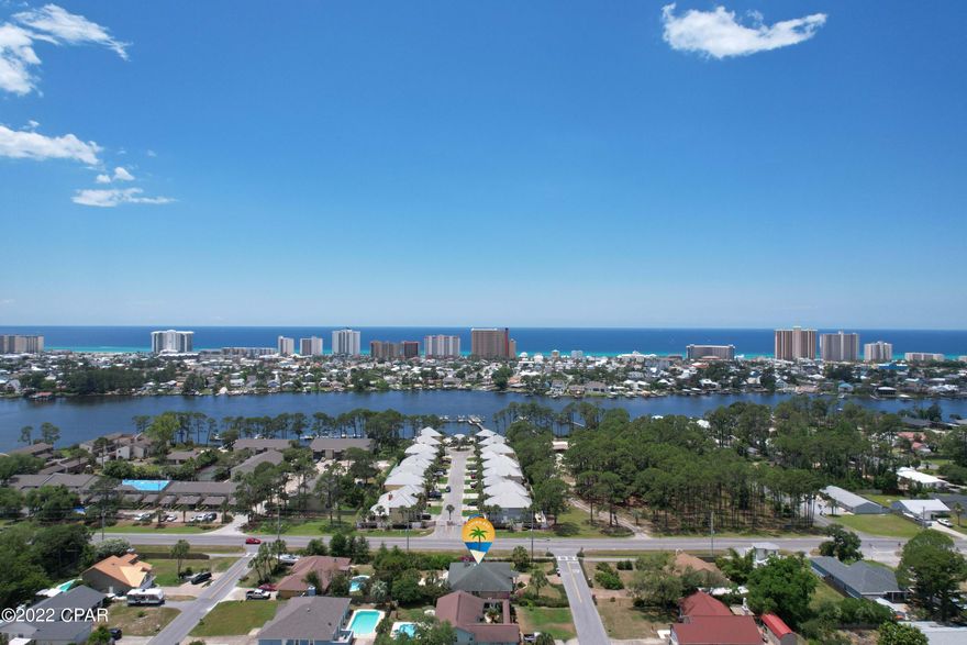 This is truly a golf cart ride to the beach or a quick walk to the Grand Lagoon.  When location is a factor, this is 'WOW''! When you have NO HOA fees to pay and NO FLOOD INSURANCE requirements, it means money in the bank!  Enjoy the wood burning fireplace and the double garage! The exterior of the home was recently painted, and a new water heater was added in the past few months.  There is much to love about the area with great access to many SUPER dining and shopping experiences. The sidewalks on North Lagoon will allow for that daily walk, but the GORGEOUS BEACH close by should be the REAL drawing card!