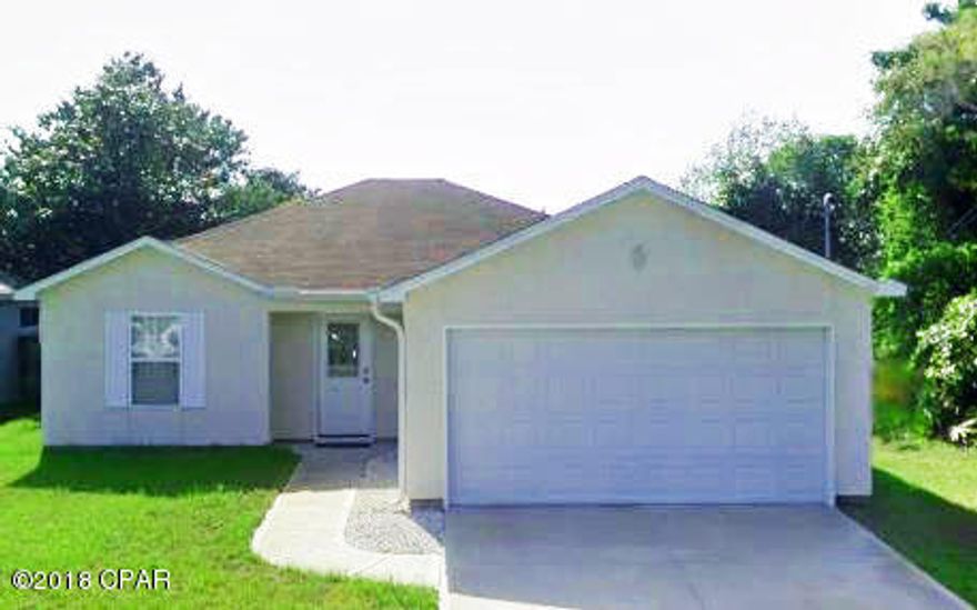 Adorable beach home with fresh paint, new sod and more!!  This one will go fast!  Don't miss your chance!