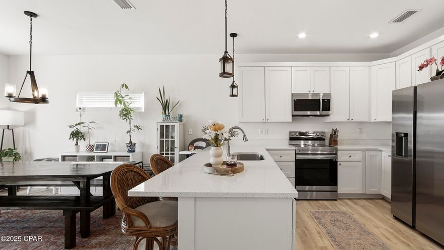 **CURRENTLY UNDER CONTRACT, SELLER WILL CONSIDER BACKUP OFFERS** Discover the perfect balance of style, function, and location in this newer Craftsman-style home. Nestled within an established neighborhood with no HOA and no flood insurance required, this property offers both peace of mind and affordability.

Step inside to a spacious open floor plan filled with natural light and upscale finishes. The kitchen is a showstopper with beautiful quartz countertops, a large island bar, stainless steel appliances, and white shaker cabinetry that make it ideal for both cooking and entertaining.

The primary suite is bright and inviting with a roomy walk-in closet and a private en-suite bath designed for relaxation. Throughout the home, you'll find elegant flooring with no carpet for easy maintenance and modern appeal.

The privacy-fenced backyard provides plenty of space to unwind and includes RV parking on the side and back, perfect for extra vehicles, boats, or weekend getaways. The garage offers convenient attic storage for all your seasonal items.

Located close to shopping, schools, and Tyndall Air Force Base, this home offers everyday convenience in a quiet, welcoming setting. It also features an assumable VA loan at a 5.75 percent interest rate, a rare opportunity for qualified buyers to step into a beautiful home with added financial benefits.