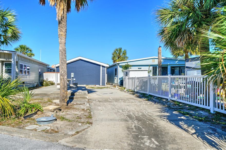 Fantastic ownership opportunity in highly sought after Venture Out! Build your dream home or bring your RV! Don't wait this one will go quickly! Venture Out is a golf cart community that has exploded with popularity recently... With 300' on the beautiful pristine beaches of the Gulf of Mexico and 1,000' on the Grand Lagoon. Venture Out has something for everyone. With 2 pools, fishing pier, boat ramp, mini golf, children's play ground and much much more!