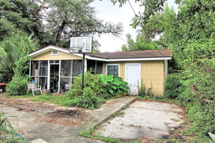 LOOK AGAIN at this listing offering 2 homes in the Cove on the same parcel. The main house is a 4/2 two story home with a 1/1 home in the back with the potential to add the attached storage room and make it a 2 bedroom. A great opportunity for a homeowner needing guest quarters / mother-in-law suite or the investor looking for rental property or fix and flip. While updates and repairs are needed this is an excellent opportunity to have 2 for the price of 1!

Great location within walking distance to downtown. The seller is motivated so book your showing today!