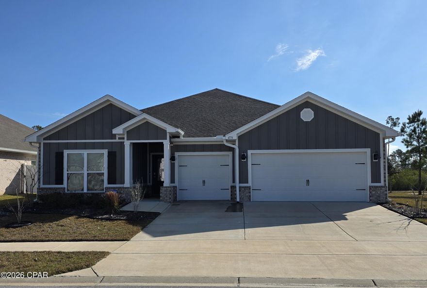 This Titus Park home is a Camden floor plan. It has a separate guest suite which has,  full bath, walk in closet, and living room. 
The front bedrooms are joined with a jack and jill bathroom and completely split from the master bedroom. This home backs up to preserve land and provides added privacy.

 It is located 6 miles from route 77 and 23 street. 14 miles from Tyndall, and 30 minutes to the Navy Dive center. Centrally located with Publix at Lindsey xing and Winn Dixie. North Bay Haven Charter School within a 5 minute drive. 

Lynn Haven Bayou Park and Preserve is about a 5 minute drive as well as boat launching for the bay and Deer Point lake. Titus Park community center includes a pool and dog recreation area. This neighborhood provides your family with lots of safe walking, and bike riding, on well lit streets,