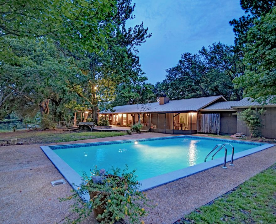 ****PRICE REDUCED FOR QUICK SALE****

Yes, it needs updating but if you're looking for a secluded, peaceful waterfront site in Panama City, this is it. Beautiful waterfront bordered by hardwoods and natural landscaping, pool and lots of venues to entertain or relax are the selling points of this home. A large great room, eat-in kitchen with breakfast bar and expansive master suite just add to the draw of this personal retreat that exists within a short distance of restaurants, shopping, medical services and the quaint St. Andrews area. Motivated seller who wants to make Mexico Beach their permanent home.