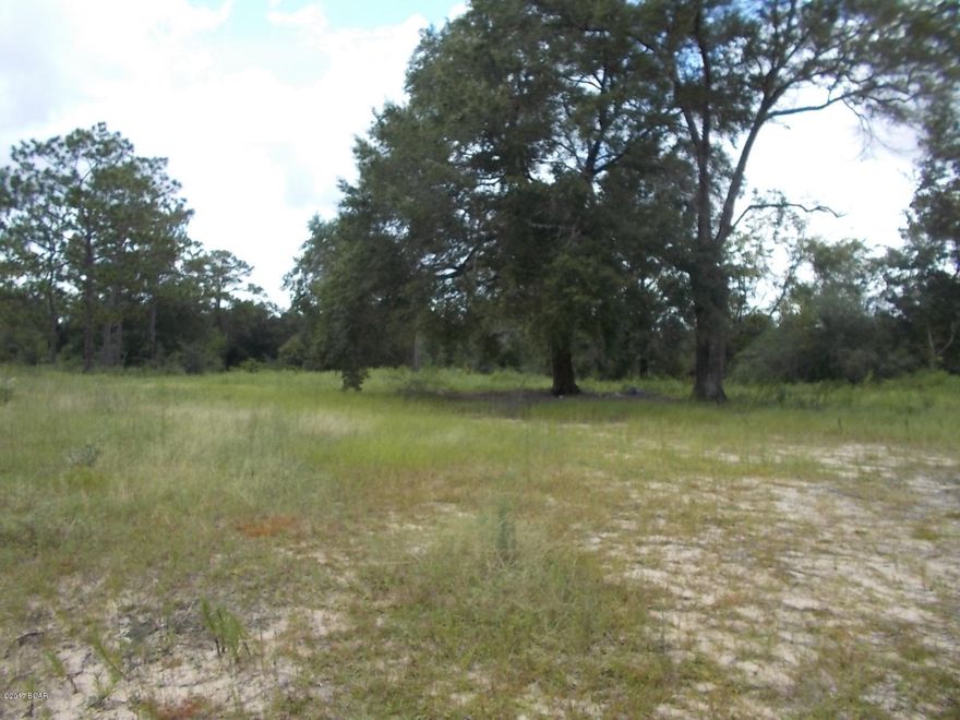 LAND HAS BEEN CLEARED READY TO BUILD ON. HAS HAD A WELL AND SEPTIC ON IT, ALSO POWER.

 HAS A CONCRETE PAD WOULD BE GREAT FOR A SHOP TO BE BUILT ON IT OR GARAGE.

 YOU HAVE 400 FT ON THE ROAD GOES BACK 189 FT. PLUS YOUR SET BACK. ON A RISE SO IT WOULD BE HIGH AND DRY.