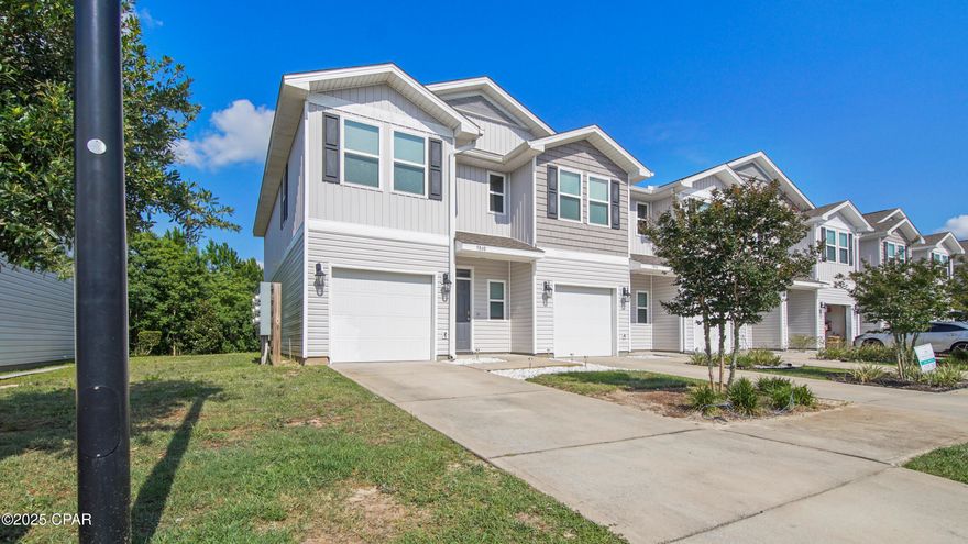 This newer 3-bedroom, 2.5-bath, end unit townhome is just 10 minutes from Tyndall Air Force Base and is pet friendly. Rent includes trash and yard care. A washer and dryer is also included! Perfectly situated within walking distance to Walmart, restaurants, shopping, and more. Enjoy all the conveniences right at your doorstep! The community features a pool, sun decks, and extra guest parking. Inside, you'll find a nice kitchen with a pantry, a large living room, and a convenient half bath downstairs. Upstairs hosts all three bedrooms, a full bath, and the laundry area. The spacious master suite boasts a huge walk-in closet and a nice master bath. Step out to the back patio and enjoy the wooded view—no houses behind you! The community also offers sidewalks, green spaces for pet walks, and a community pool!