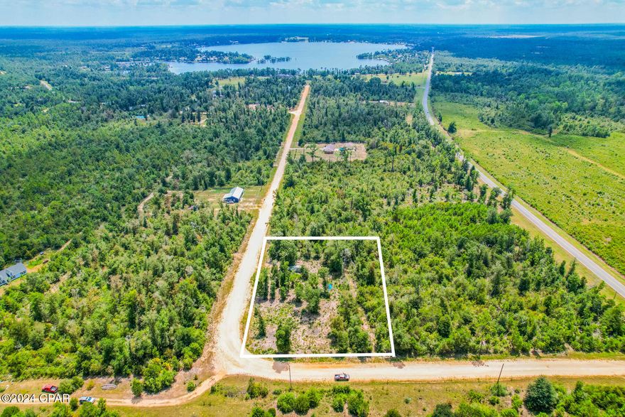 Discover the potential of this 1 acre, corner lot in Alford, Florida situated in the beautiful neighborhood of Compass Lake! This prime piece of land offers unique opportunity to create your ideal retreat or dream home! With its generous size and natural surroundings, you'll enjoy ample space and privacy while still being close to the waters of Compass Lake. Whether you're envisioning a  private getaway, a family estate, or an investment for the future, this lot provides the flexibility to bring your vision to life! Call your agent today for your private showing!